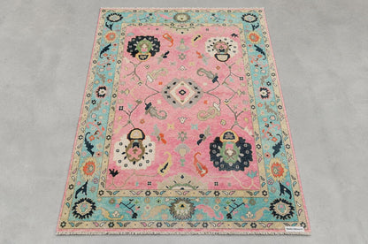 Pink Oushak Rug with Teal Border | ModernWeavers Hand-Knotted Wool Area Rug | Turkish Floral Medallion Carpet for Living Room or Nursery